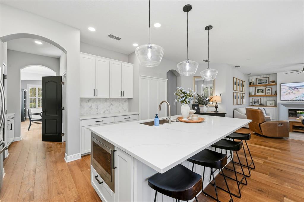 13912 Darchance Road Windermere, FL 34786 - Photo 21 of 49 a kitchen with a table and chairs in it