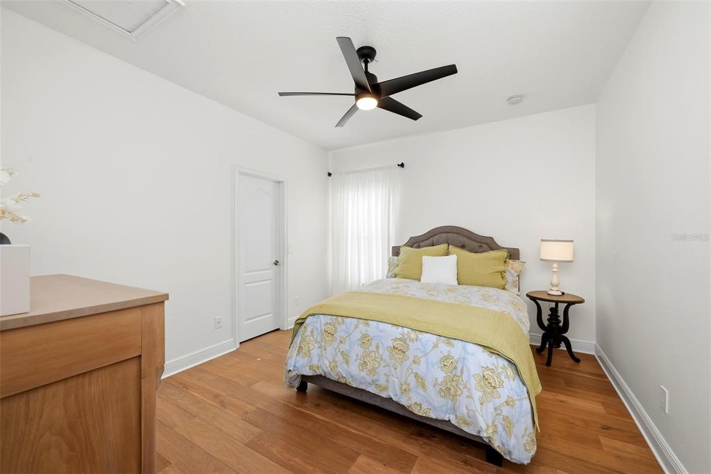 13912 Darchance Road Windermere, FL 34786 - Photo 42 of 49 a bedroom with a bed and a dresser