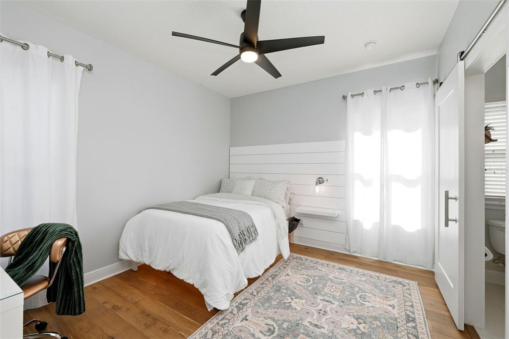 13912 Darchance Road Windermere, FL 34786 - Photo 44 of 49 a bedroom with a bed and a window