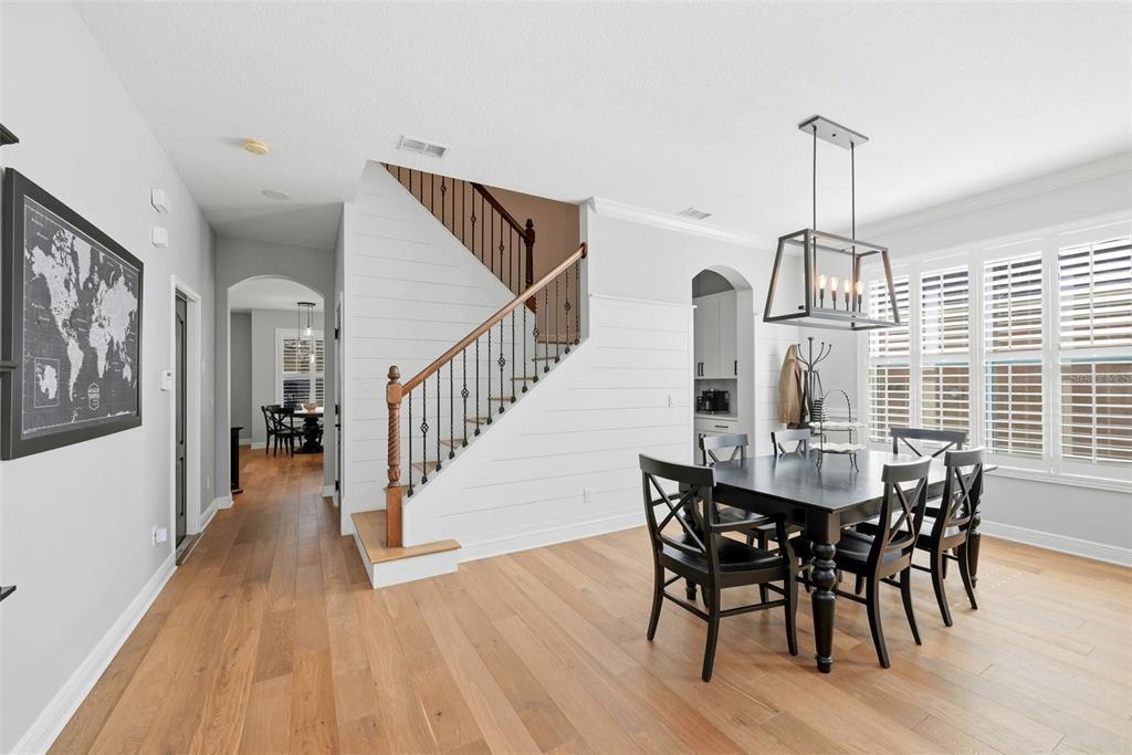 13912 Darchance Road Windermere, FL 34786 - Photo 10 of 49 a view of a dining room with furniture window and wooden floor