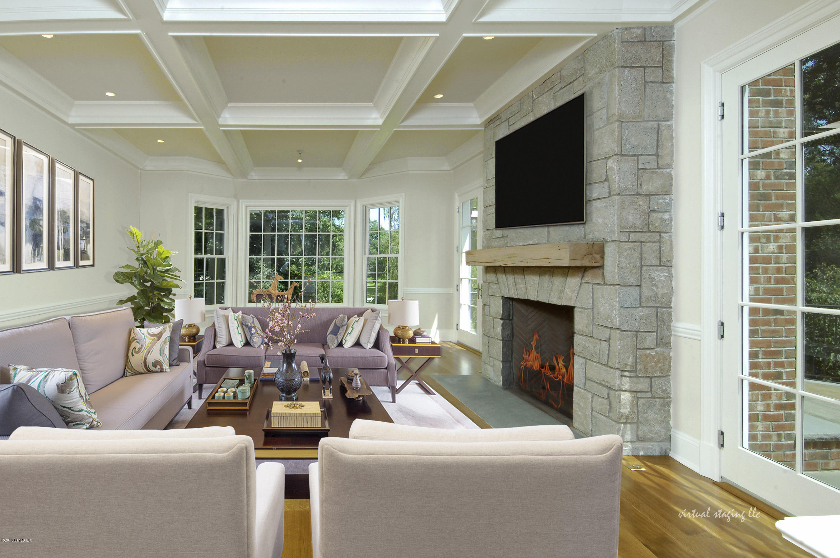 43 Burning Tree Road Greenwich, CT 06830 - Photo 11 of 24 a living room with furniture fireplace and flat screen tv