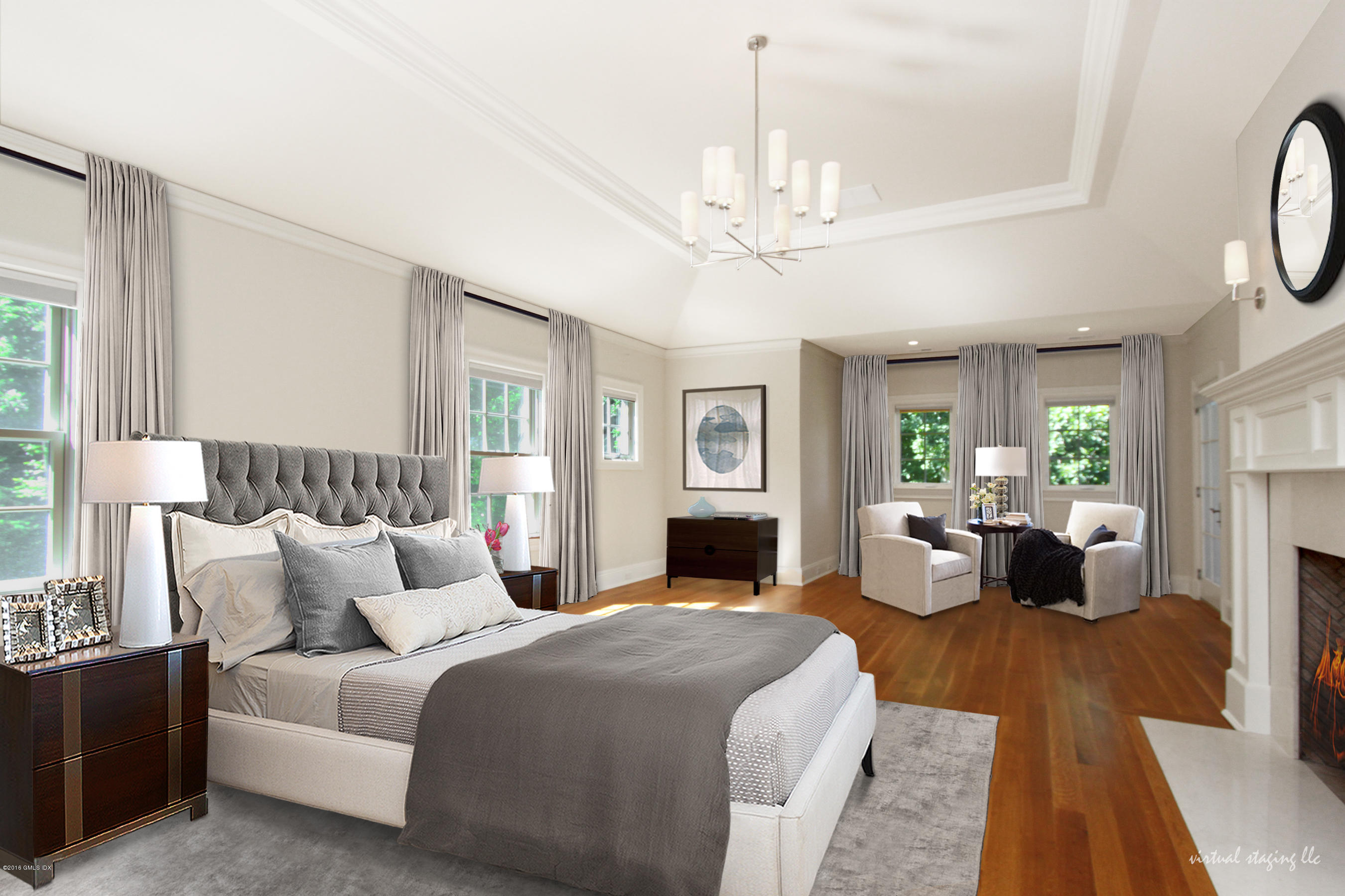 43 Burning Tree Road Greenwich, CT 06830 - Photo 14 of 24 a spacious bedroom with bed and a chandelier