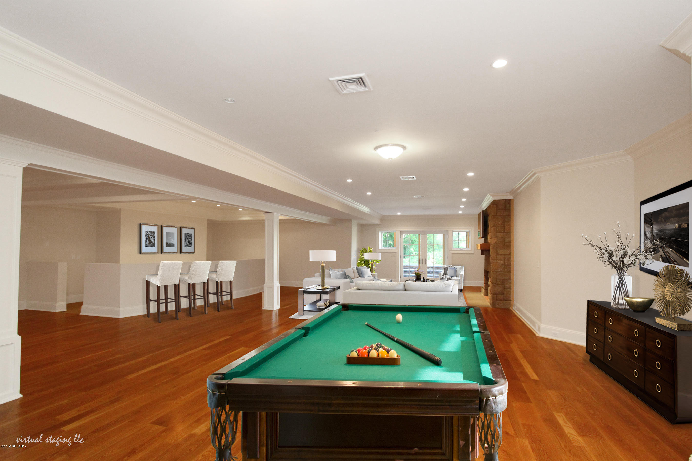 43 Burning Tree Road Greenwich, CT 06830 - Photo 18 of 24 a room with furniture pool table flat screen tv and windows