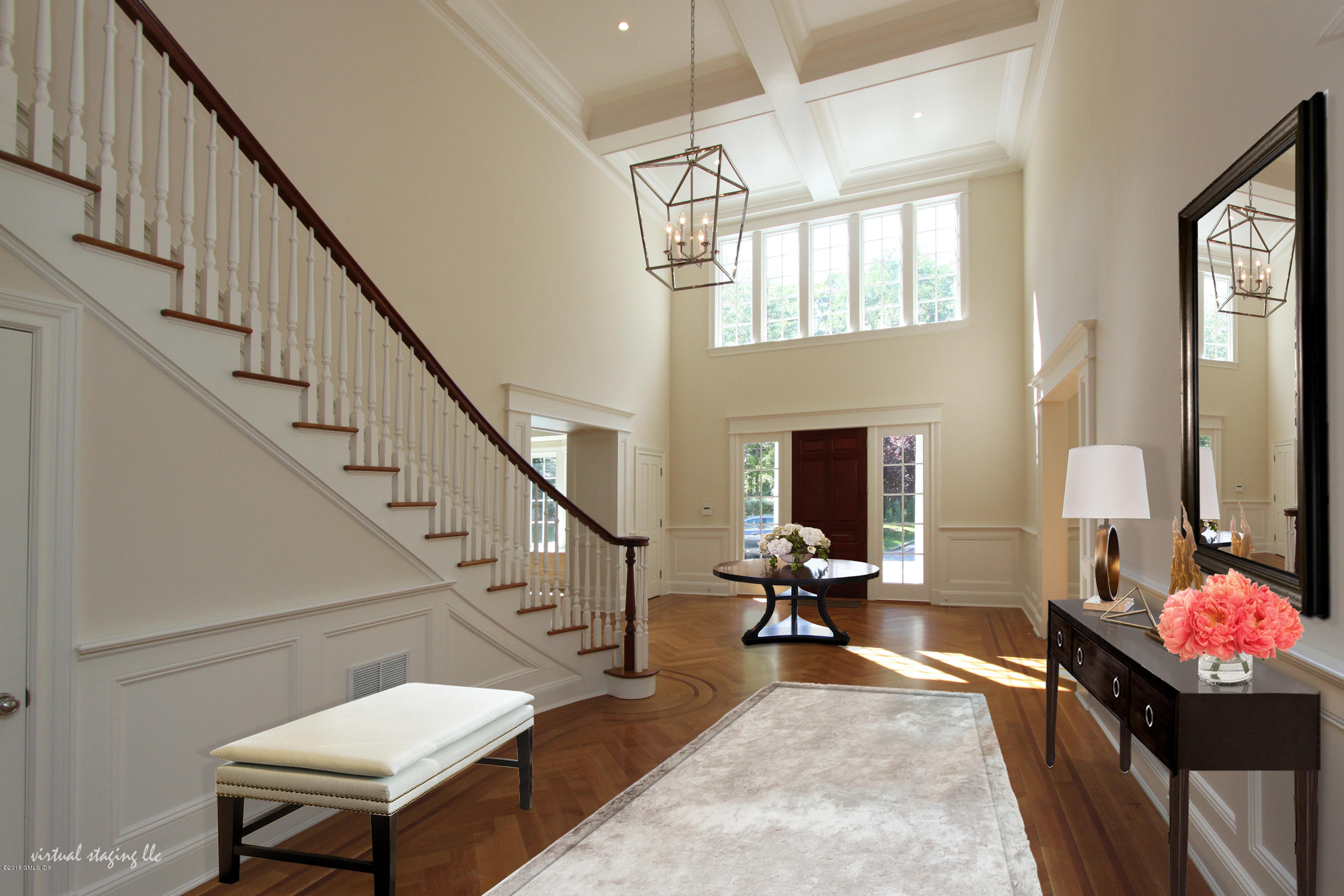 43 Burning Tree Road Greenwich, CT 06830 - Photo 4 of 24 a living room with furniture and a flat screen tv