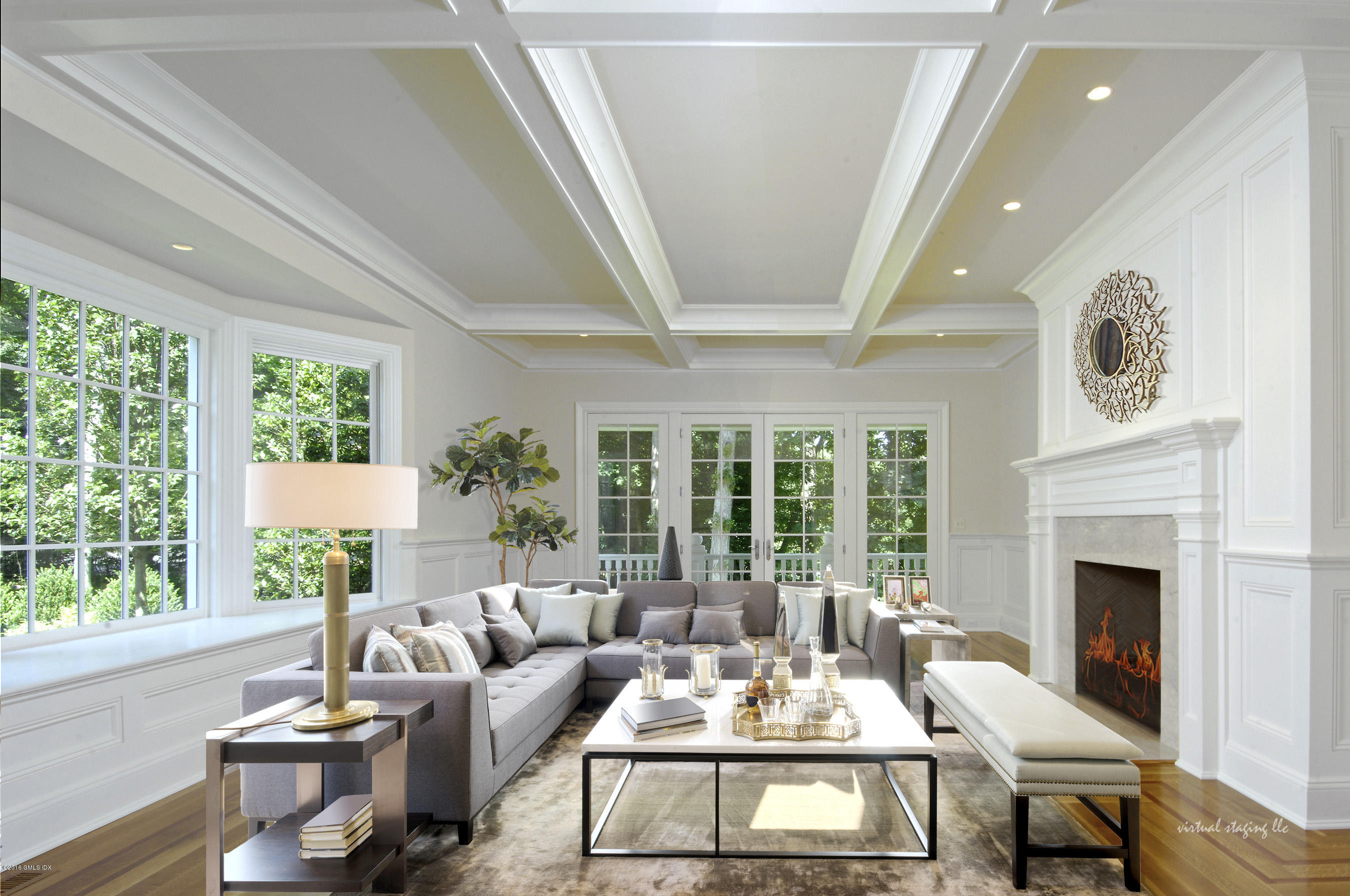 43 Burning Tree Road Greenwich, CT 06830 - Photo 5 of 24 a living room with furniture and a fireplace