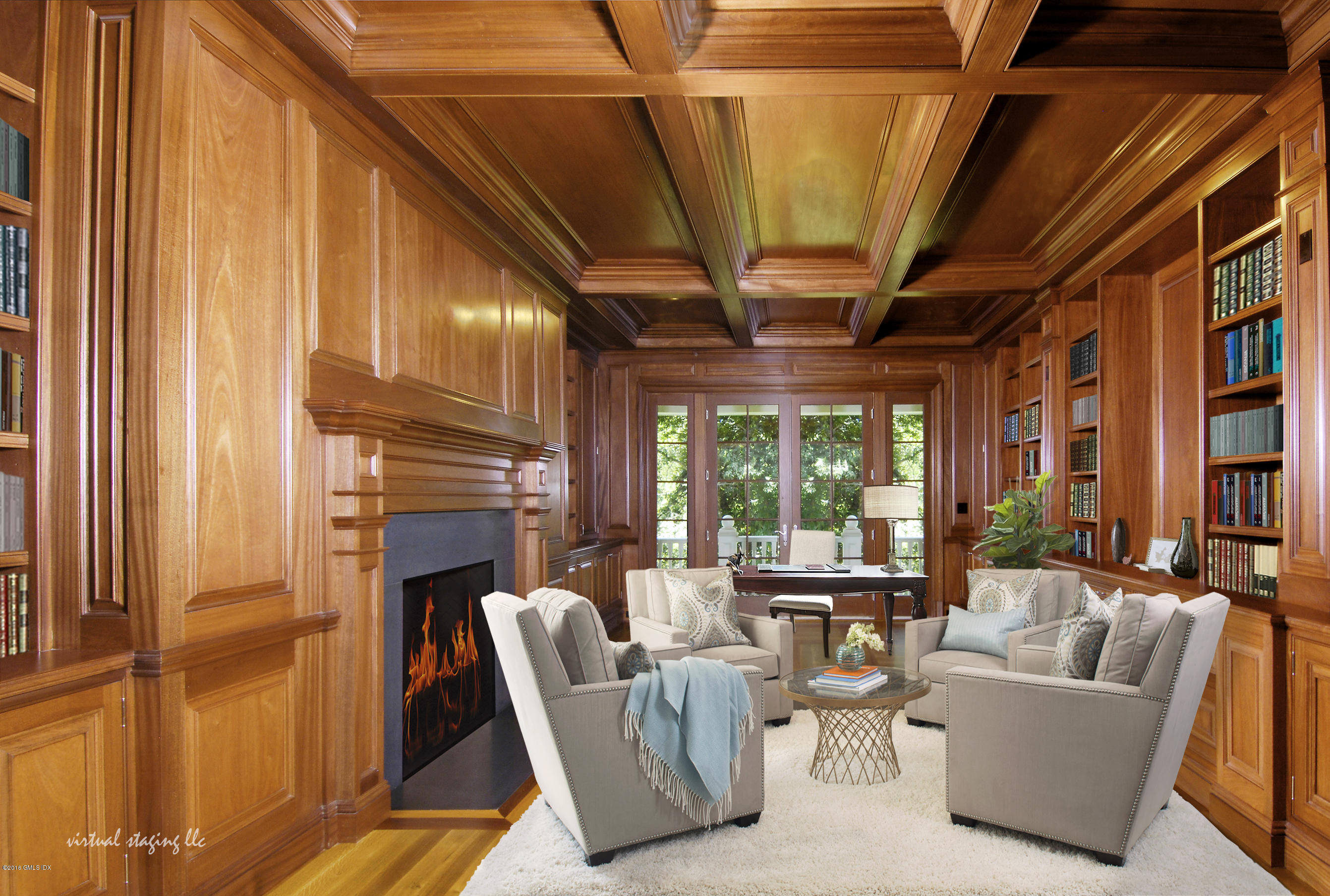 43 Burning Tree Road Greenwich, CT 06830 - Photo 7 of 24 a living room with furniture a fireplace and a large window