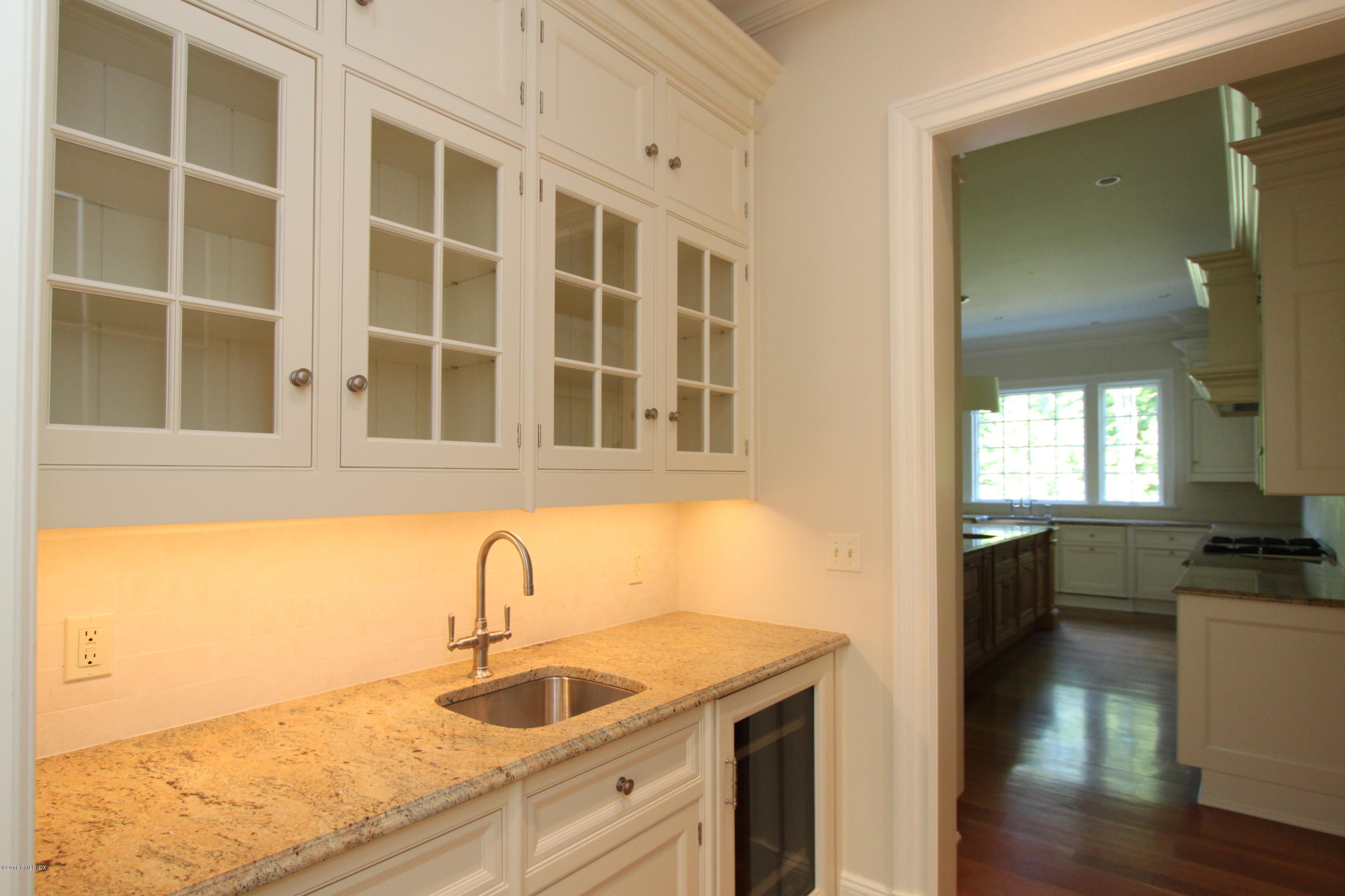 43 Burning Tree Road Greenwich, CT 06830 - Photo 9 of 24 a kitchen with a sink and a window