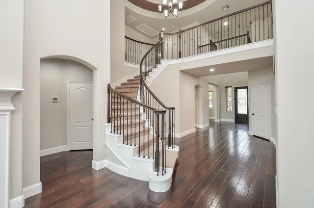 a view of entryway with wooden floor