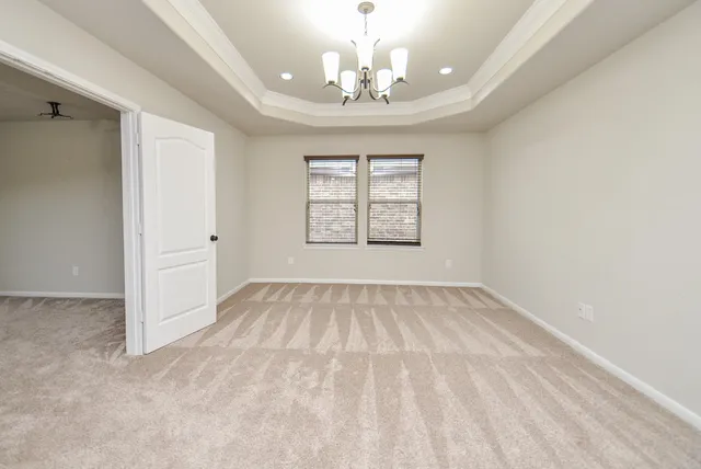 a view of a livingroom with a furniture and chandelier