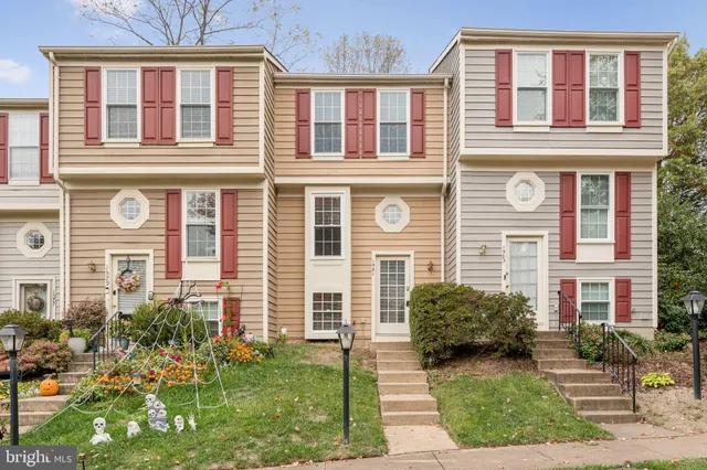 a front view of a house having yard