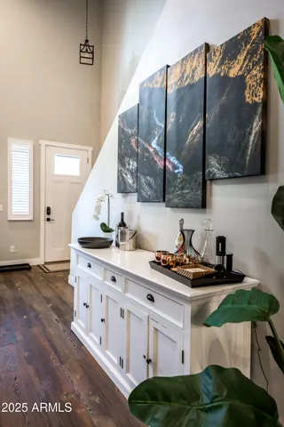a kitchen with stainless steel appliances kitchen island granite countertop a sink and cabinets