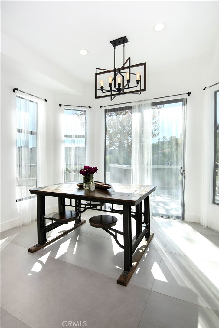 22254 Dumetz Road Woodland Hills, CA 91364 - Photo 12 of 42 a view of a livingroom with furniture and window