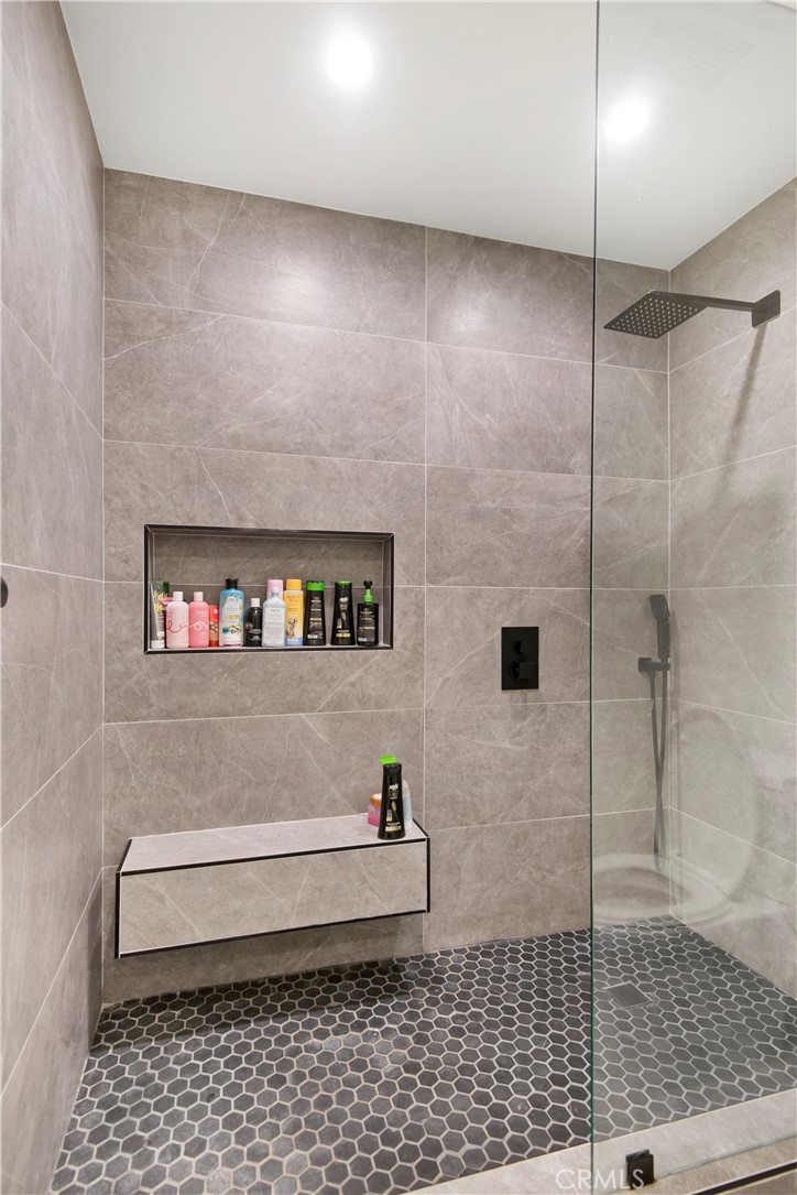 22254 Dumetz Road Woodland Hills, CA 91364 - Photo 22 of 42 a bathroom with a shower and a toilet