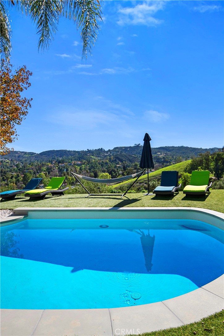 22254 Dumetz Road Woodland Hills, CA 91364 - Photo 39 of 42 a view of a tennis court