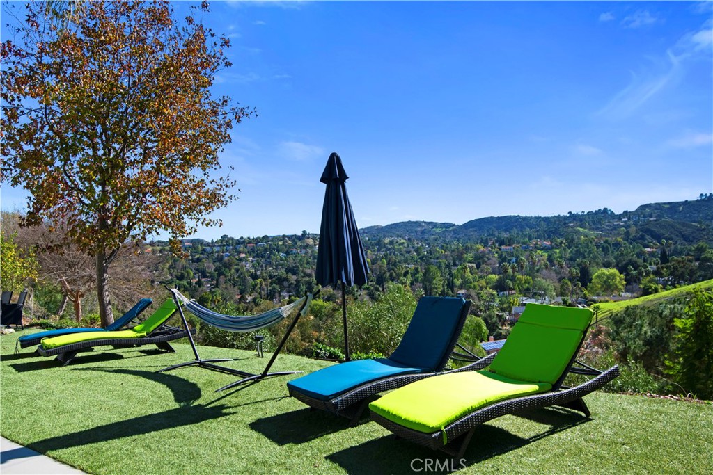 22254 Dumetz Road Woodland Hills, CA 91364 - Photo 40 of 42 a view of a chairs in a garden