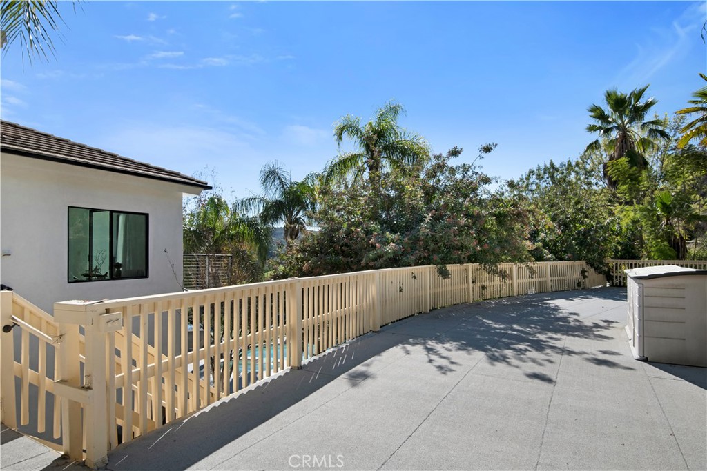 22254 Dumetz Road Woodland Hills, CA 91364 - Photo 42 of 42 a view of a two chair and table in the balcony