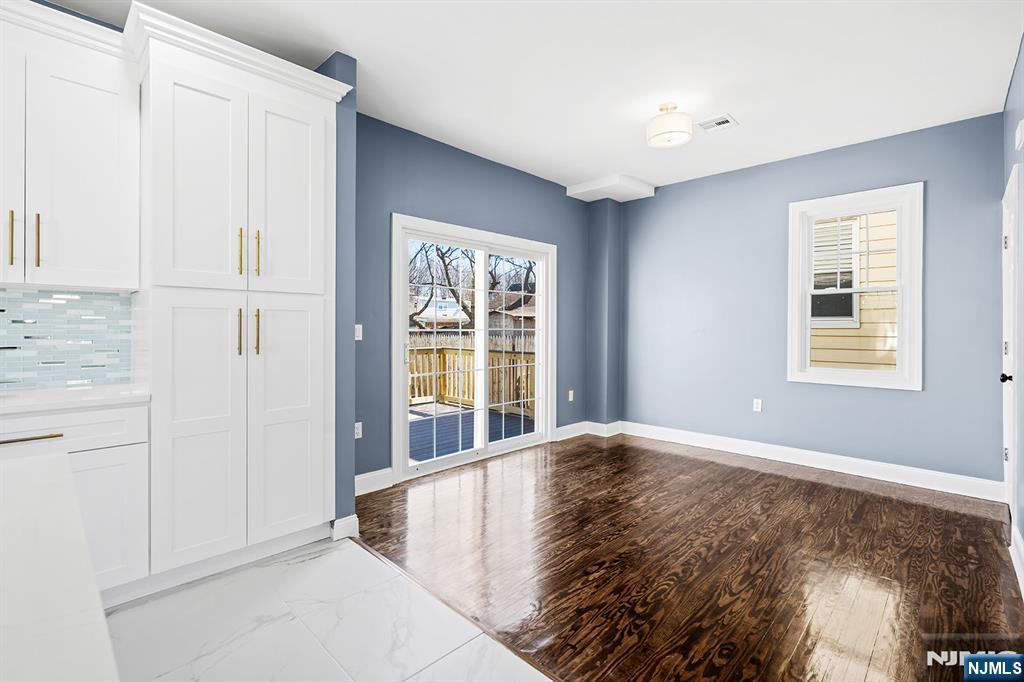 255 Garibaldi Avenue Lodi, NJ 07644 - Photo 11 of 34 a view of a bedroom with window