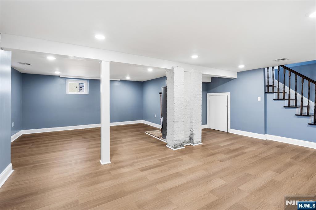 255 Garibaldi Avenue Lodi, NJ 07644 - Photo 24 of 34 a view of a livingroom with wooden floor