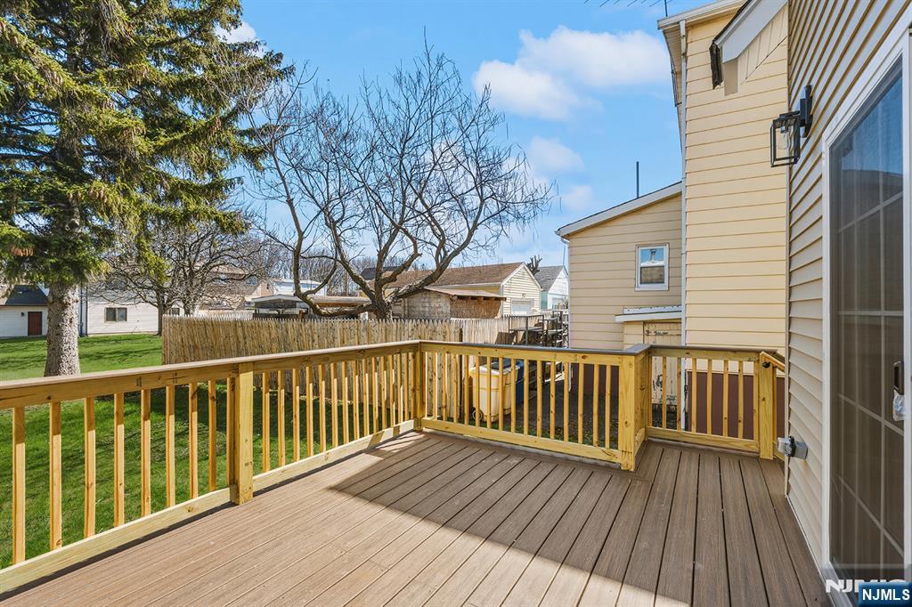 255 Garibaldi Avenue Lodi, NJ 07644 - Photo 27 of 34 a view of wooden deck with a patio