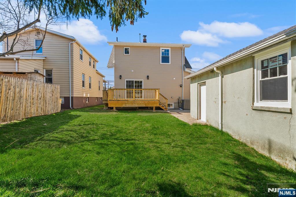 255 Garibaldi Avenue Lodi, NJ 07644 - Photo 30 of 34 a view of backyard with a garden and plants