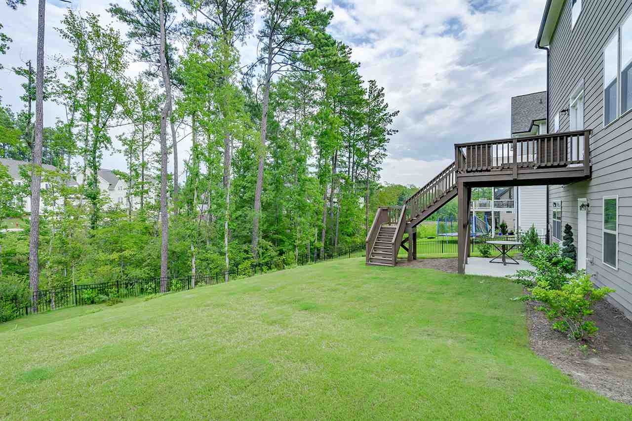 7528 Banksiana Way Raleigh, NC 27613 - Photo 27 of 30 Backyard with Wooded Views
