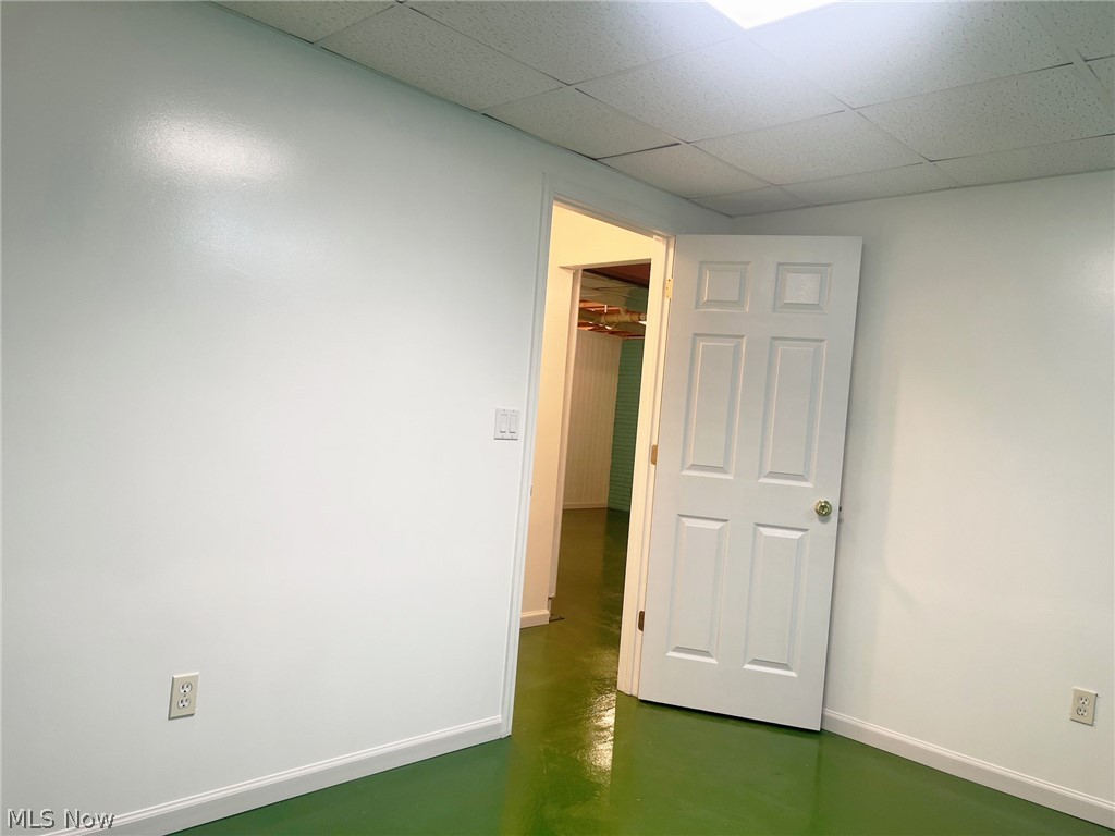 5203 Ridgeland Street Lorain, OH 44055 - Photo 25 of 39 Spare room with a drop ceiling