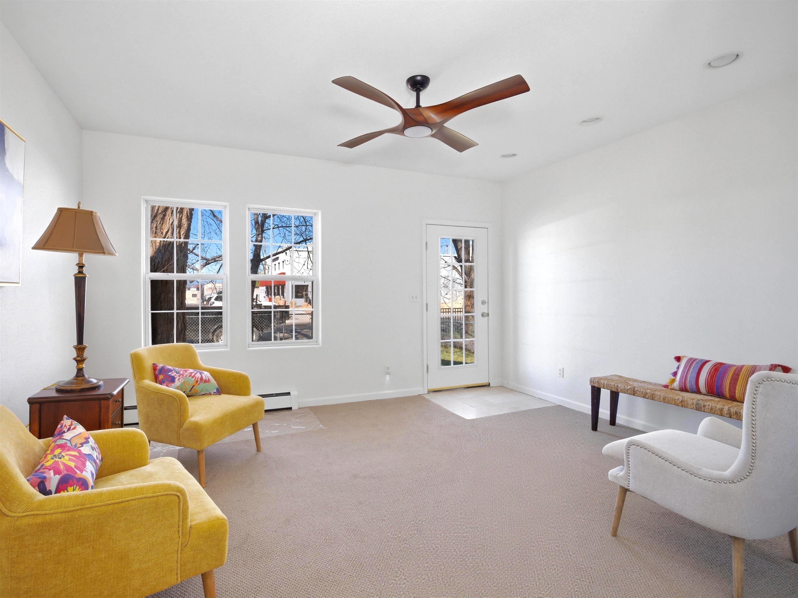 252 South Peach Street Fruita, CO 81521 - Photo 4 of 22 a living room with furniture and window
