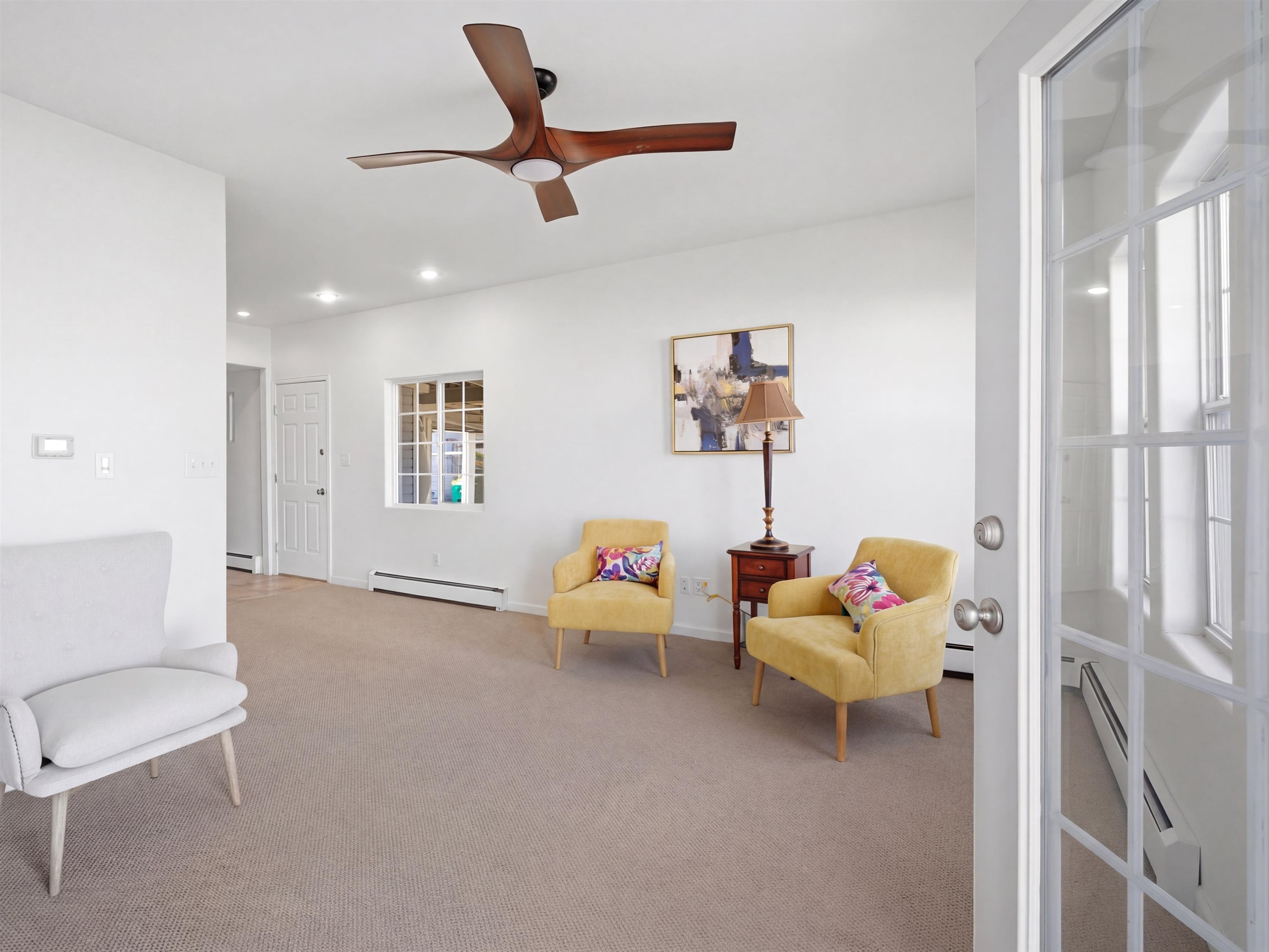 252 South Peach Street Fruita, CO 81521 - Photo 5 of 22 a bedroom with furniture and a window