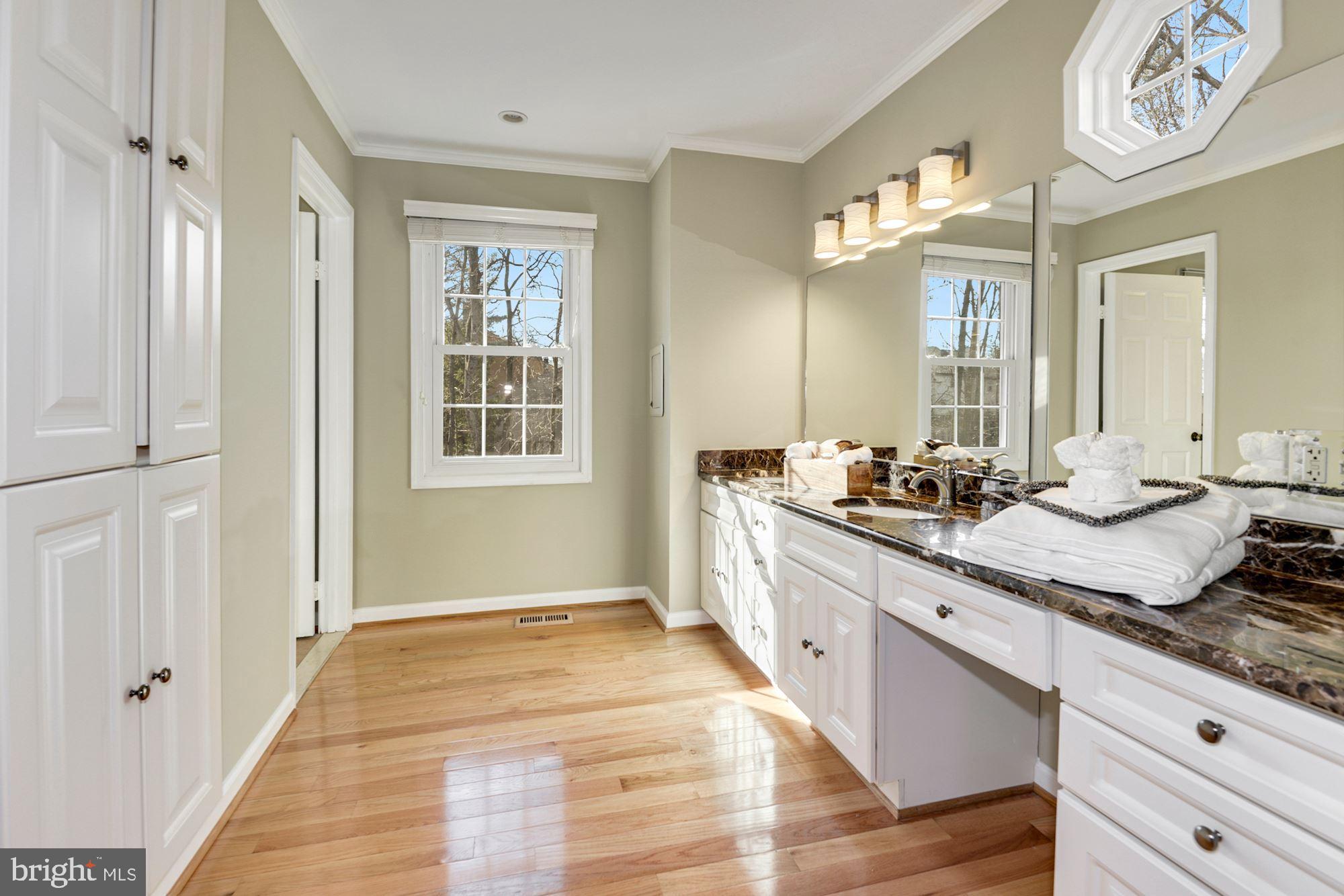 1940 Barton Hill Road Reston, VA 20191 - Photo 22 of 38 Master bath with storage and dual sinks