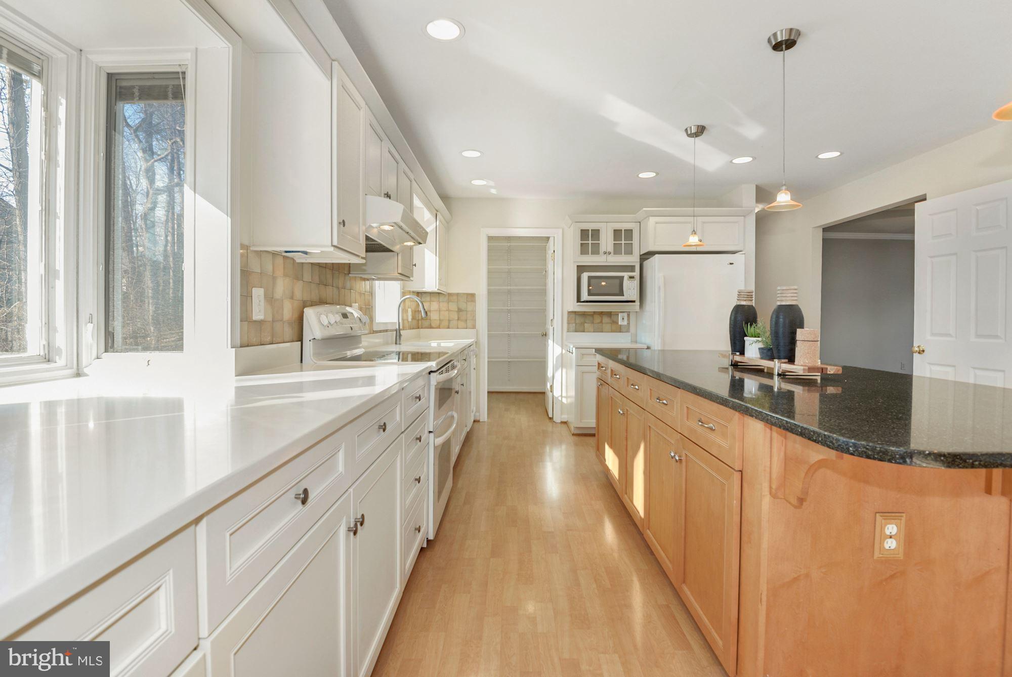 1940 Barton Hill Road Reston, VA 20191 - Photo 5 of 38 Bright kitchen with large island