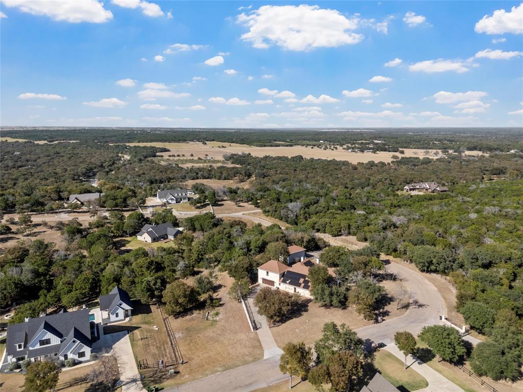 1125 Whispering Oaks China Spring, TX 76633 - Photo 38 of 39 Drone / aerial view of a heavily wooded area