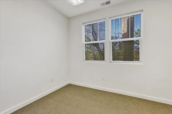 a view of a back yard of the house