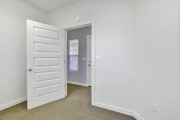 a view of a backyard with green space