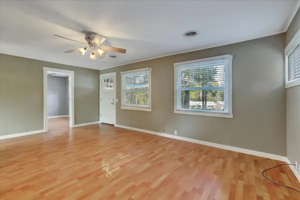 a kitchen with stainless steel appliances granite countertop wooden cabinets a stove top oven a sink and dishwasher