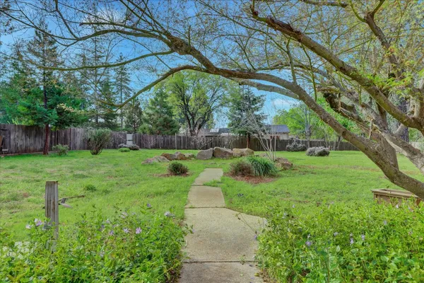 an aerial view of a house with a swimming pool