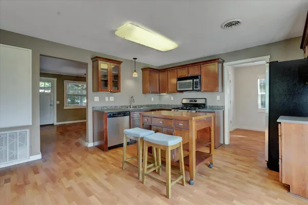 a view of an empty room with a window