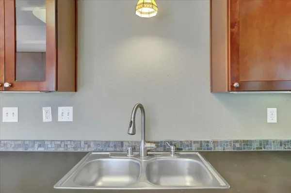 a view of a room that has a window in it