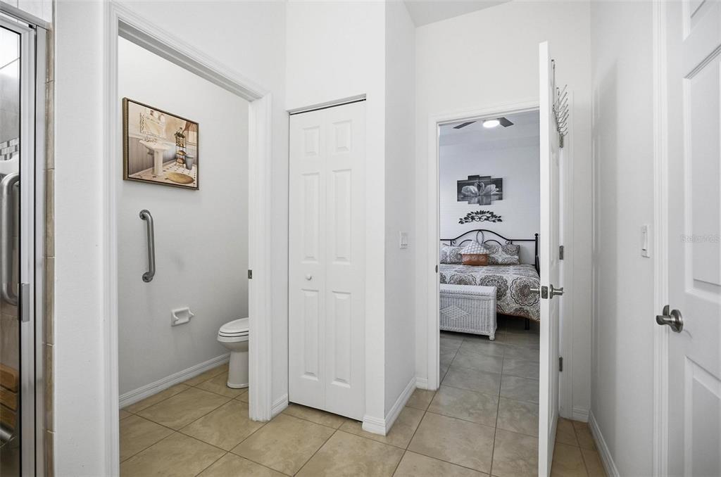 2 Tideway Trail Palm Coast, FL 32137 - Photo 20 of 34 a bathroom with a toilet and a shower