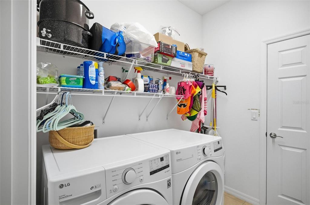 2 Tideway Trail Palm Coast, FL 32137 - Photo 28 of 34 a utility room with dryer and washer