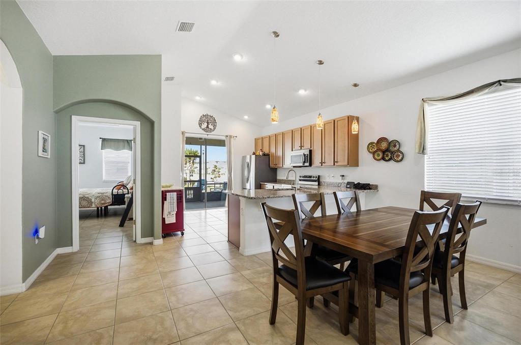 2 Tideway Trail Palm Coast, FL 32137 - Photo 8 of 34 a view of a dining room with furniture and a chandelier