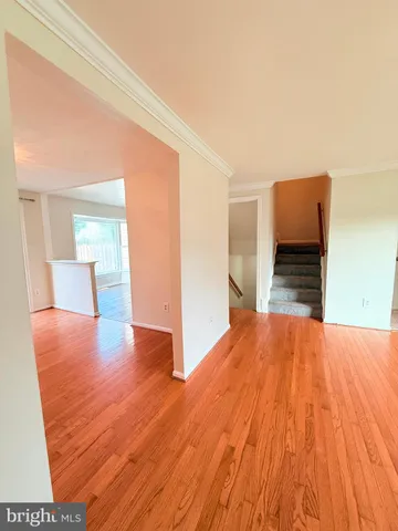a view of a glass door with a yard from a window