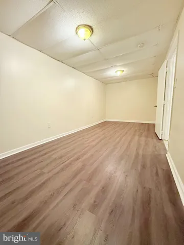 a bathroom with a toilet and a bathtub