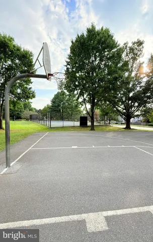 a childrens park with lots of swings and slides