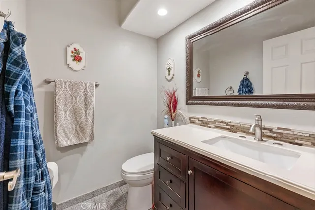 a bathroom with a sink and a toilet