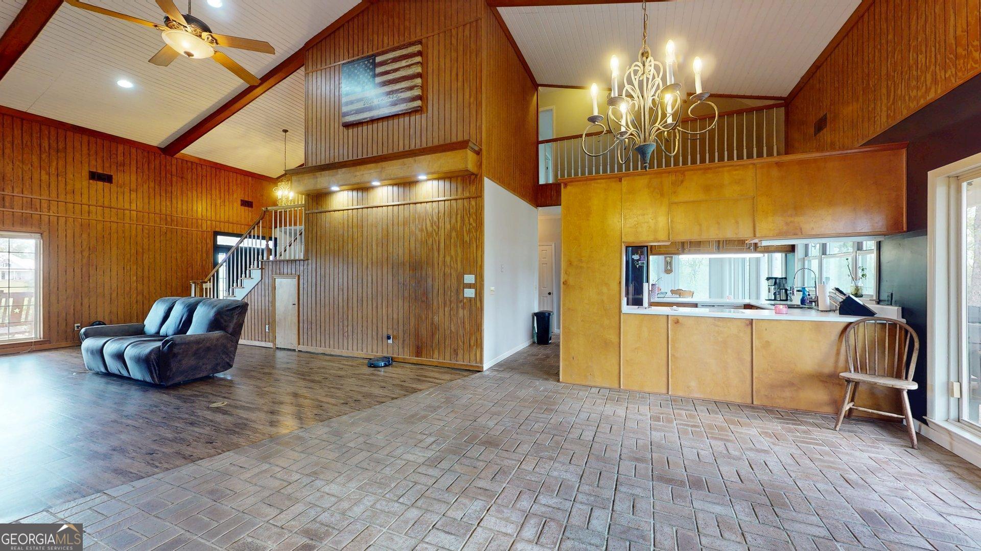 1717 Grady Saunders Road Portal, GA 30450 - Photo 14 of 41 a view of livingroom with furniture and chandelier