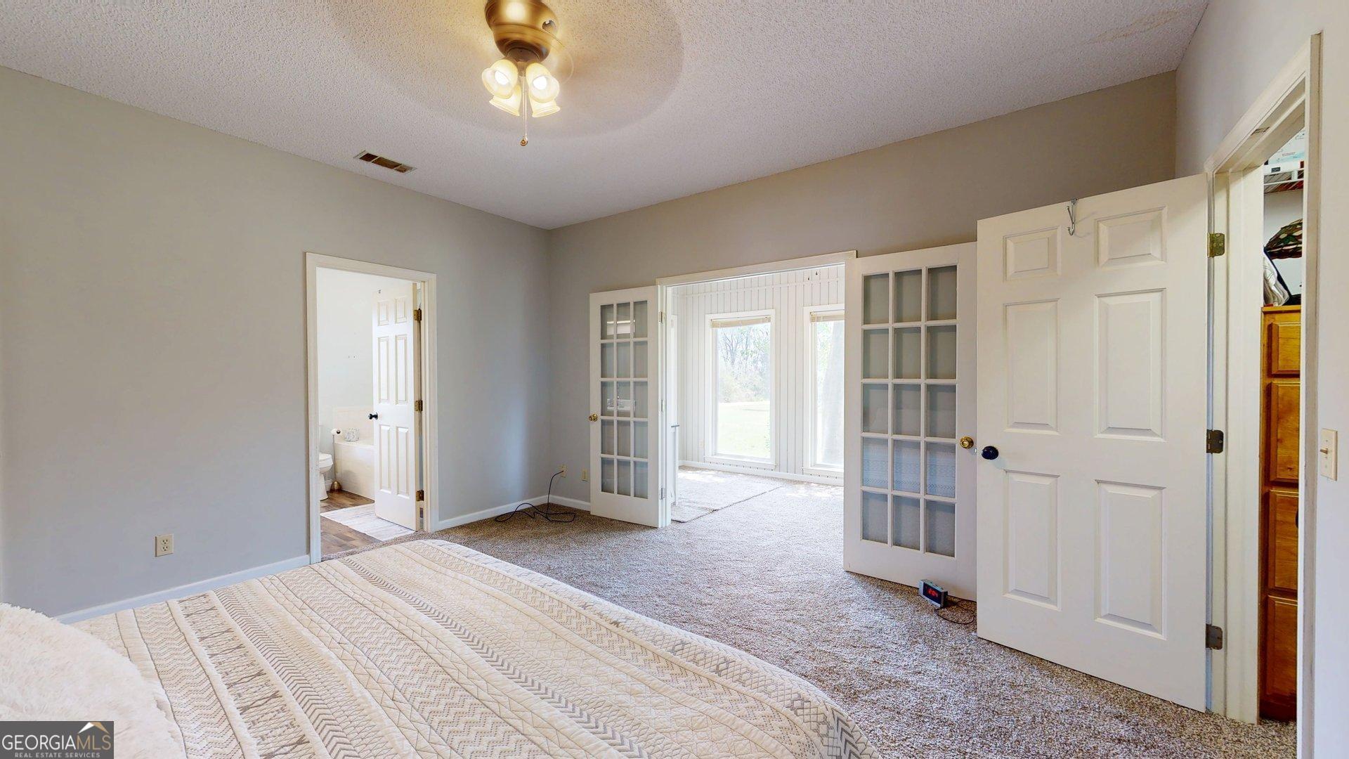 1717 Grady Saunders Road Portal, GA 30450 - Photo 23 of 41 a view of entryway with wooden floor and cabinet