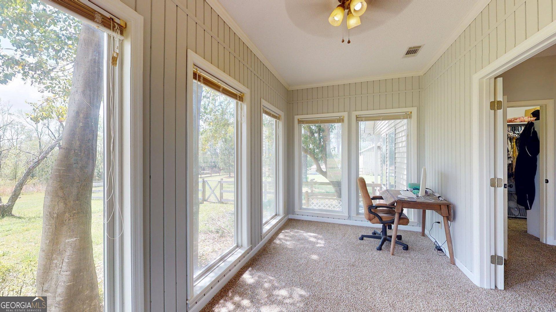 1717 Grady Saunders Road Portal, GA 30450 - Photo 28 of 41 a living room with furniture and a window