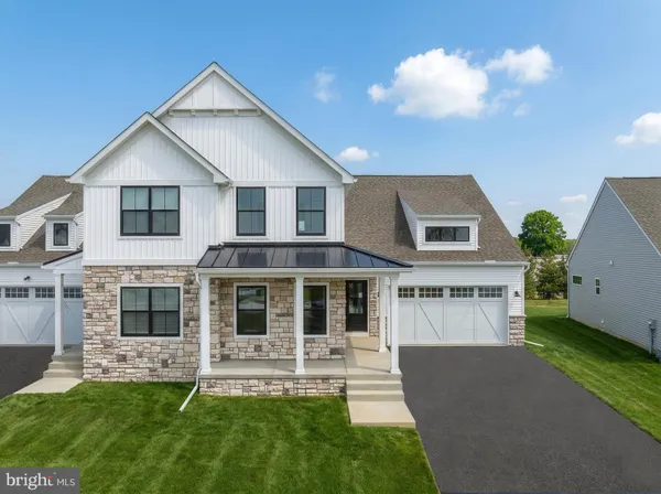 an aerial view of a house with outdoor space and street view