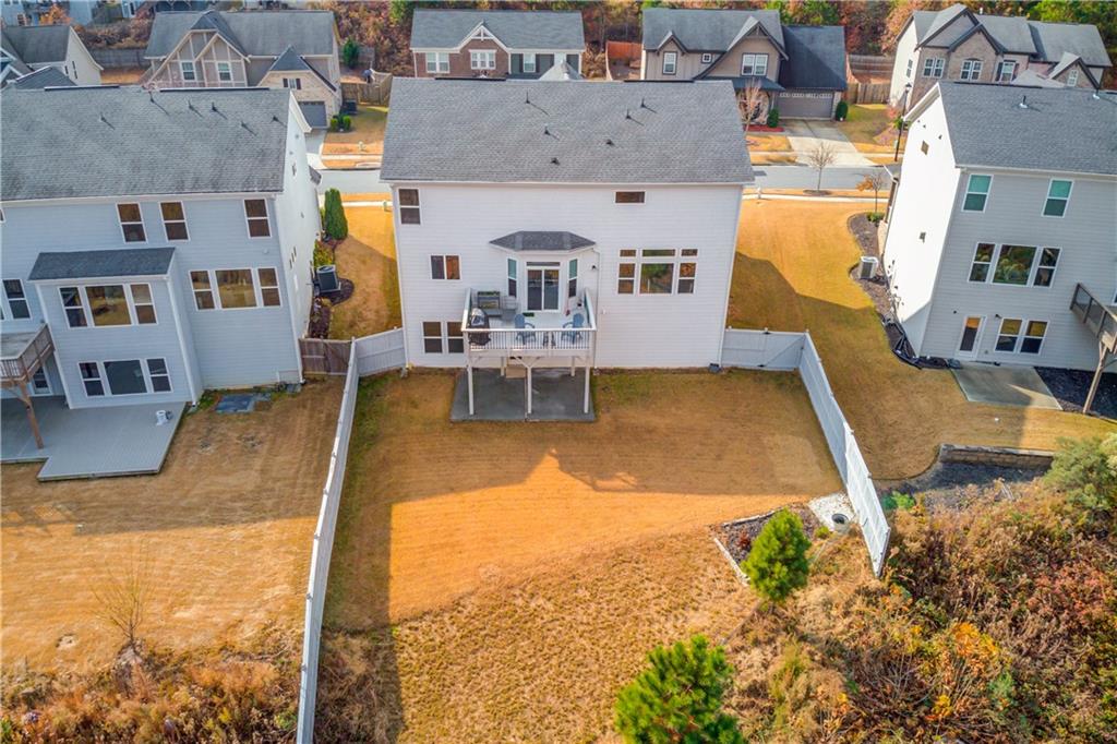1810 Primrose Park Road Sugar Hill, GA 30518 - Photo 45 of 51 an aerial view of a house with swimming pool