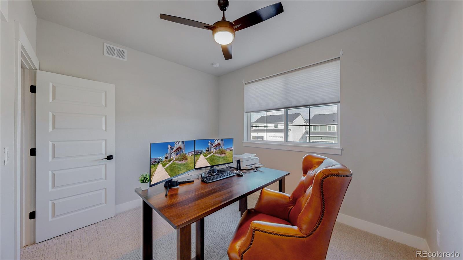 275 Dipper Court Berthoud, CO 80513 - Photo 20 of 34 a living room with furniture and a window